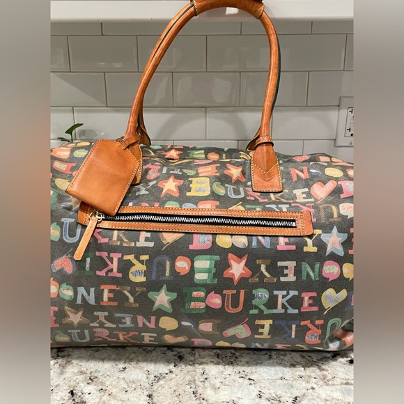 Dooney & Bourke Handbags - Dooney & Bourke Multicolor carry on duffle bag